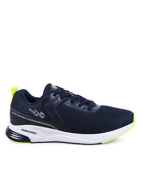 lace fastening flat heeled sports shoes