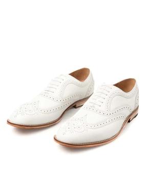 lace-up oxfords with broguing
