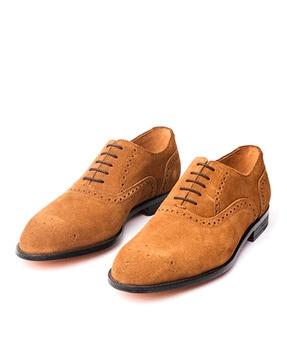 lace-up oxfords with broguing