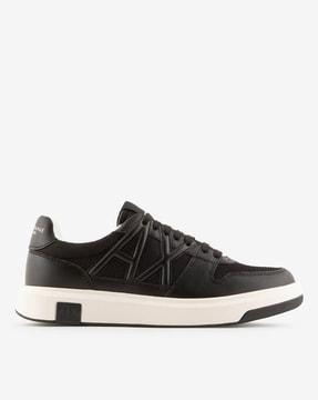 lace-up sneakers with logo stitching