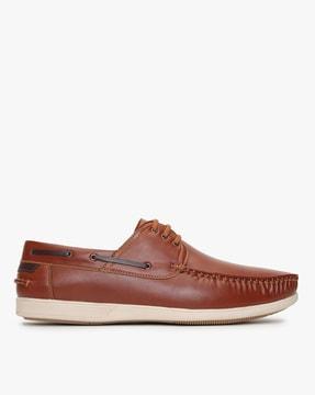 lace-up boat shoes with moc-stitch upper