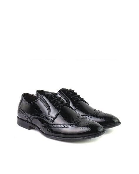 lace-up derby shoes with broguing