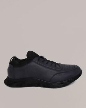 lace-up shoes with perforations