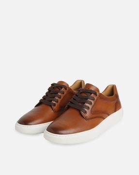 lace-up sneakers with genuine leather upper