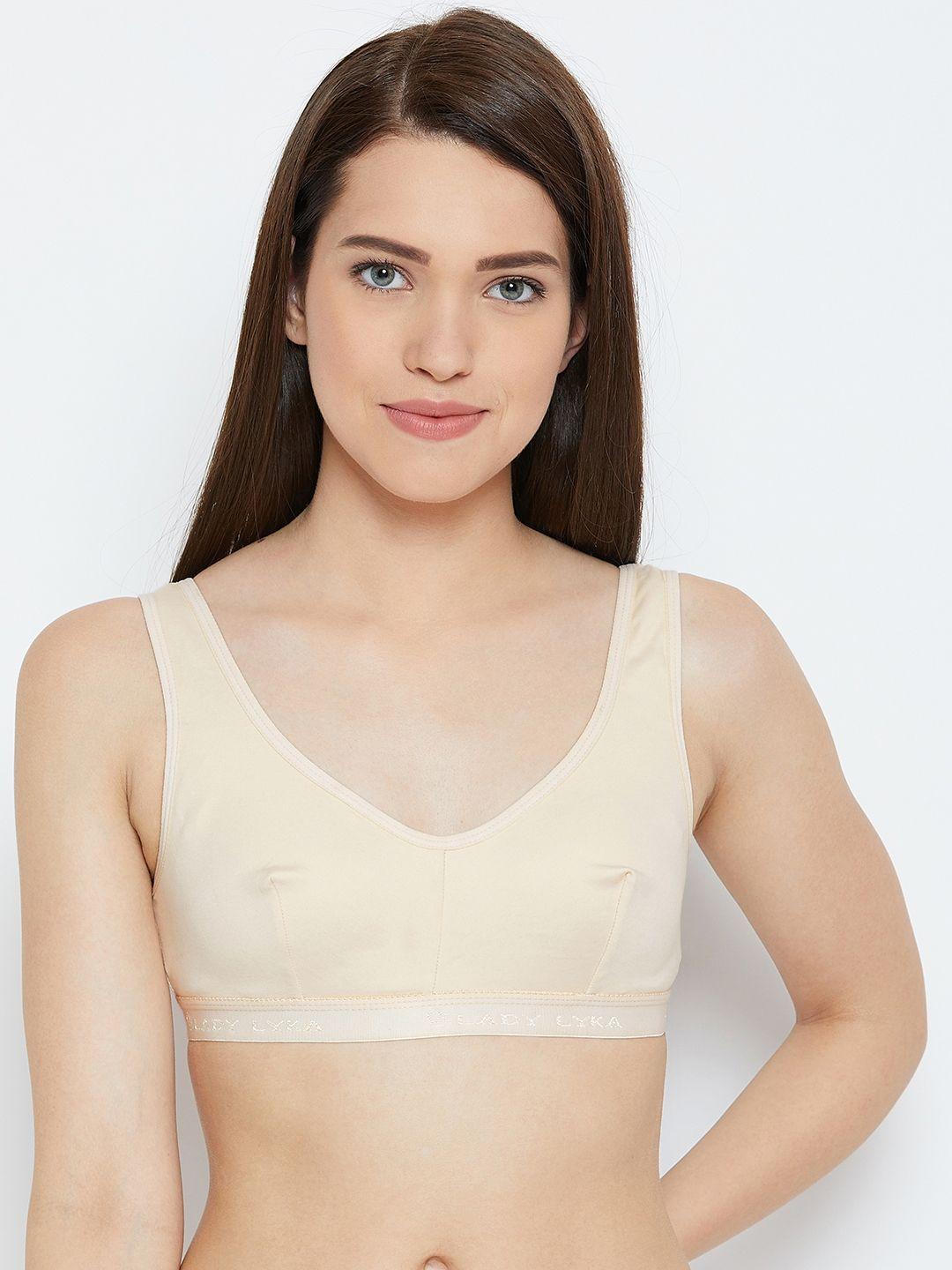 lady lyka teenager cream-coloured solid non-wired non padded sports bra