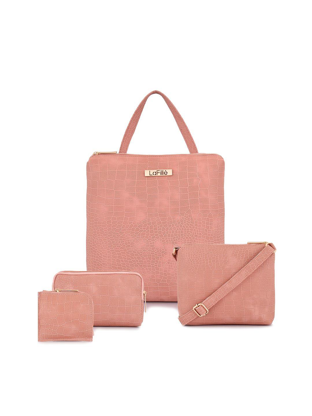 lafille peach-coloured pu structured handheld bag with cut work