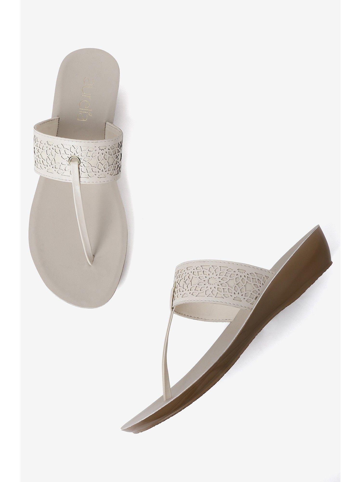 laser cut ecru almond toe wedge