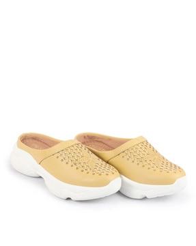 lazer-cut slip-on shoes