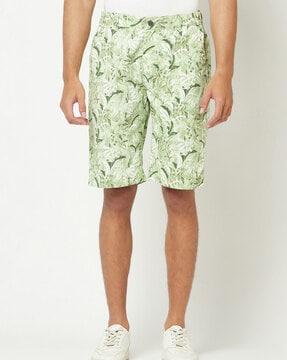 leaf-print flat-front shorts