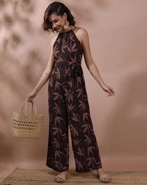 leaf print halter-neck jumpsuit with waist tie-up