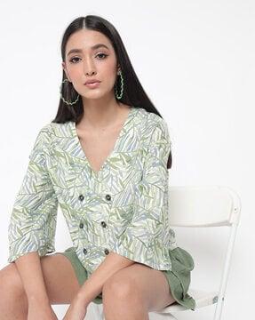 leaf print v-neck top with bell sleeves