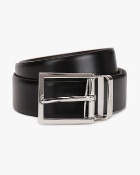 leather belt with tang-buckle closure
