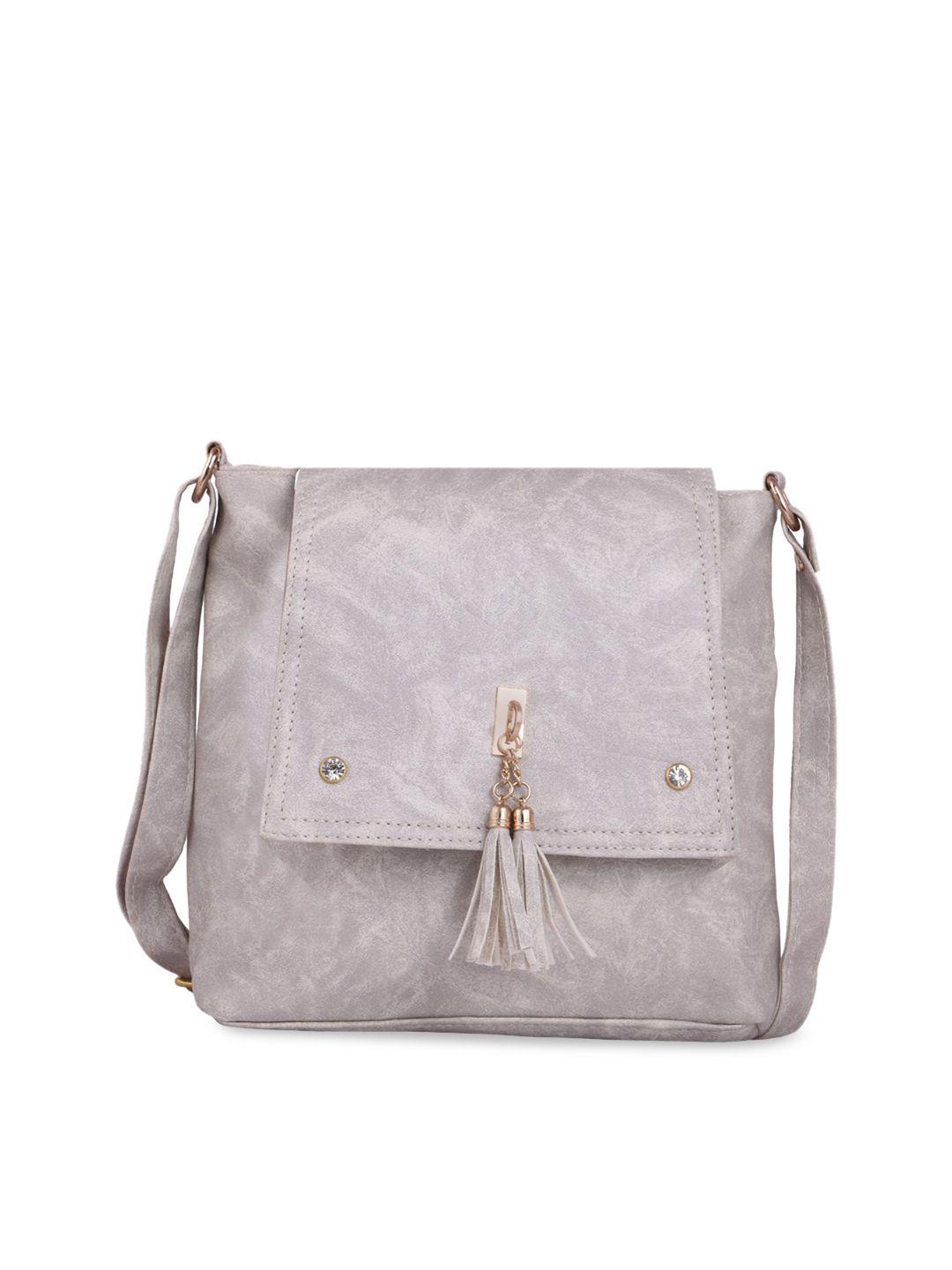leather retail silver-toned pu structured sling bag with tasselled