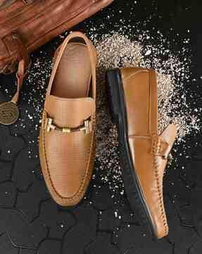 leather loafers with metal accent