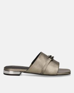 leather mules with metal accent