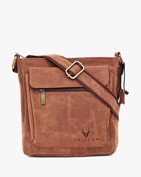 leather sling bag with adjustable strap