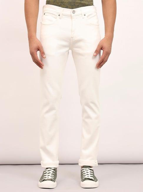 lee travis off white slim fit lightly washed jeans