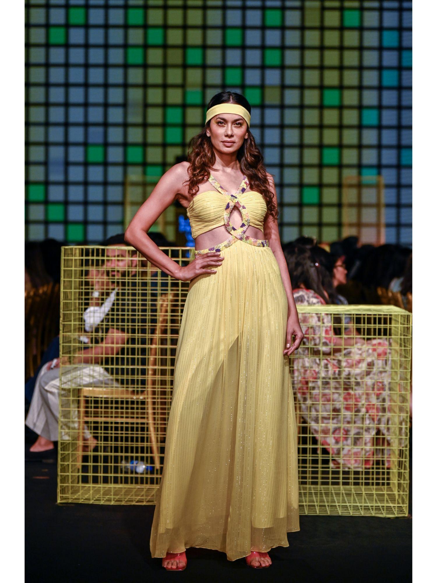 lemon yellow draped gown with hand embroidered neckline and centre slit