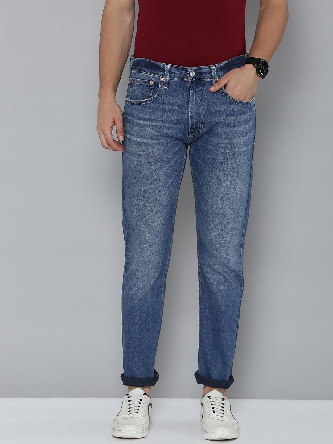 levis men tapered fit faded jeans