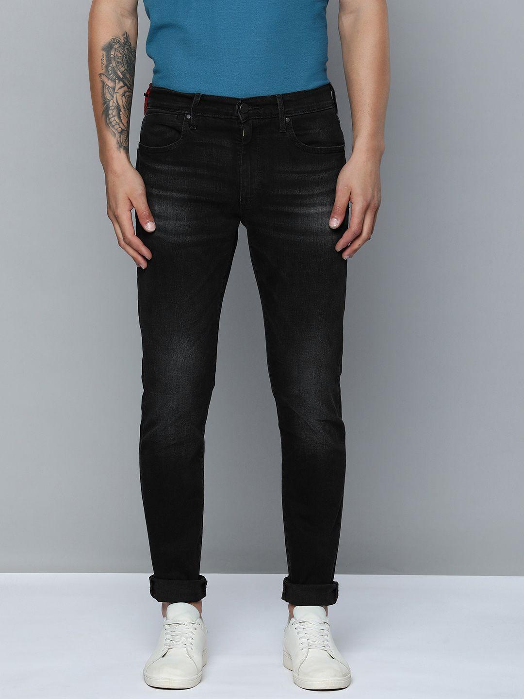 levis men tapered fit light fade stretchable jeans