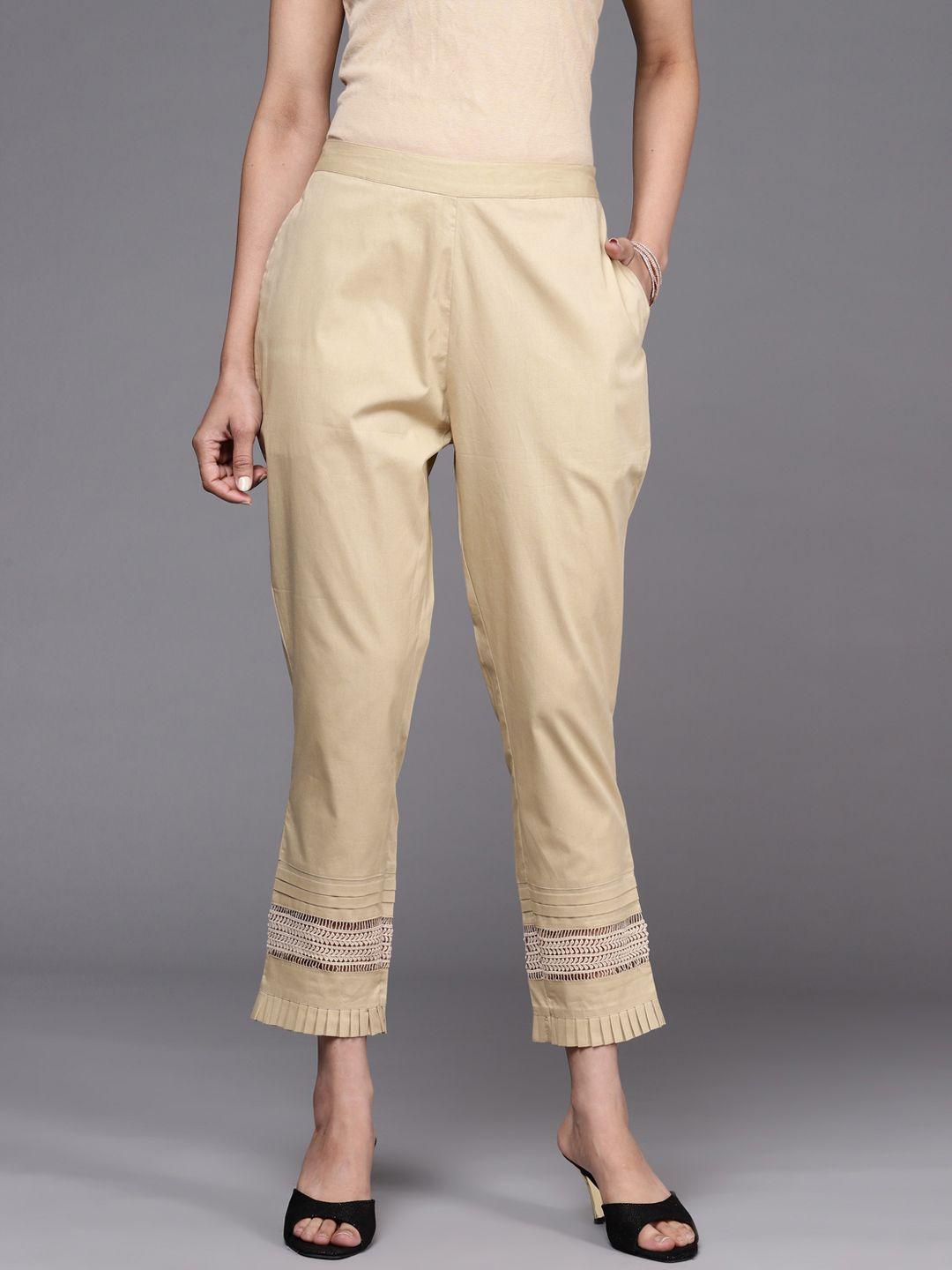 libas women beige solid pure cotton trousers
