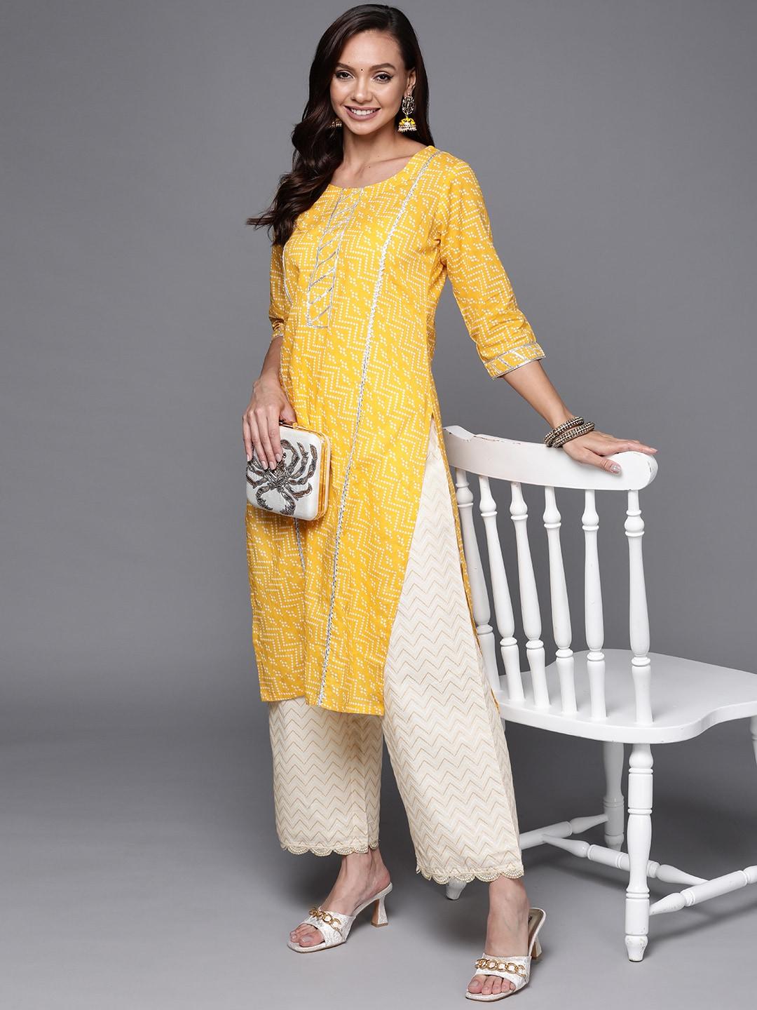 libas women cream-coloured printed knitted ethnic palazzos