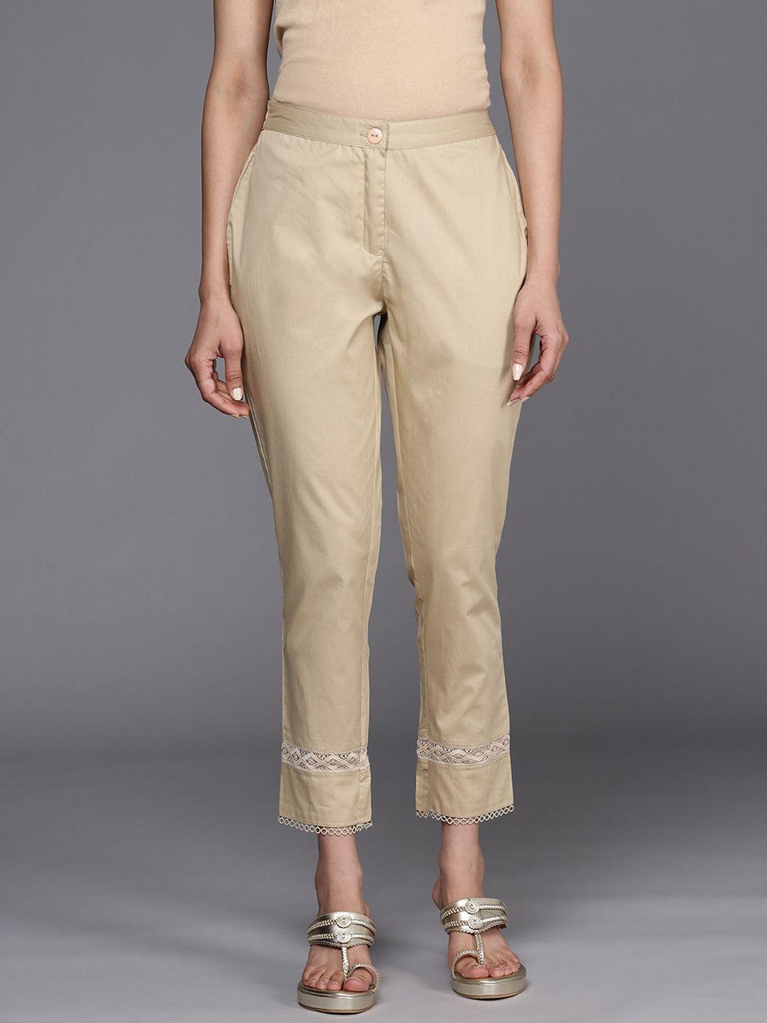 libas women beige solid straight fit pure cotton trousers