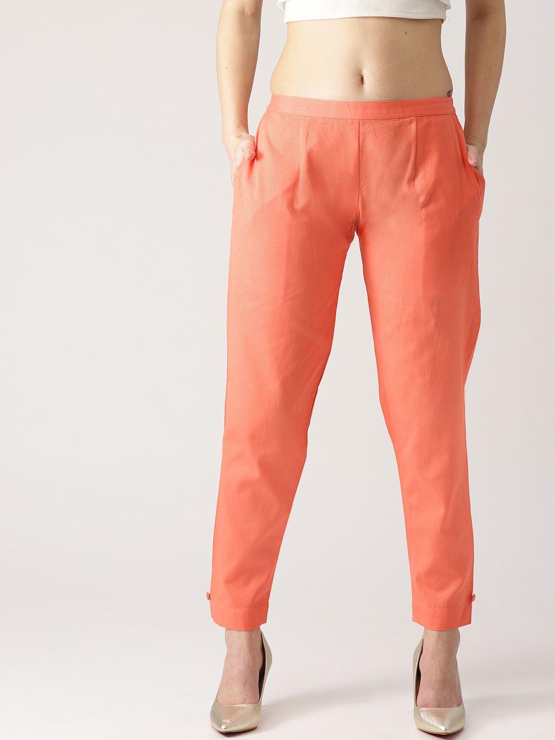 libas women coral orange regular fit solid trousers