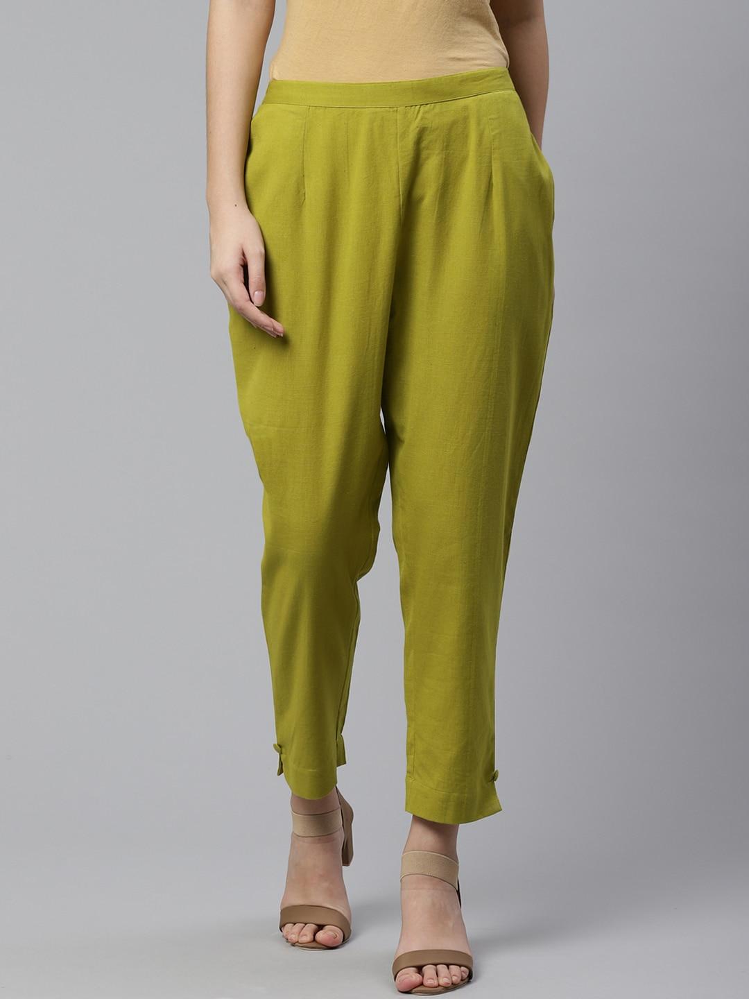 libas women lime green regular fit solid cropped trousers