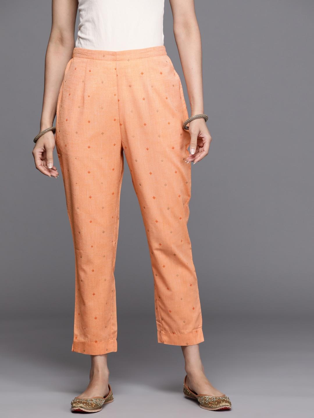 libas women orange ethnic motifs printed trousers