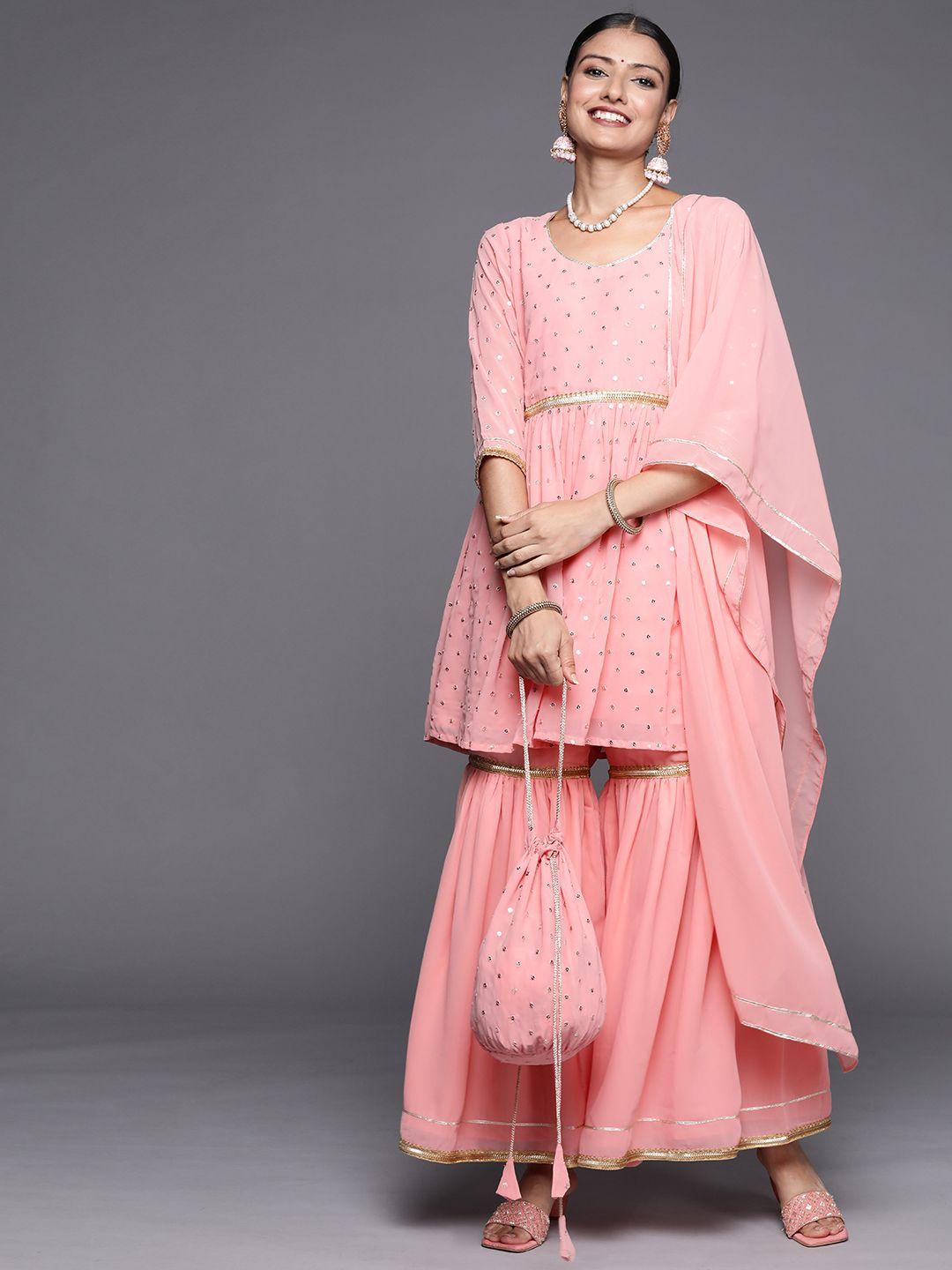 libas women peach-coloured sequinned embellished kurta with sharara & dupatta