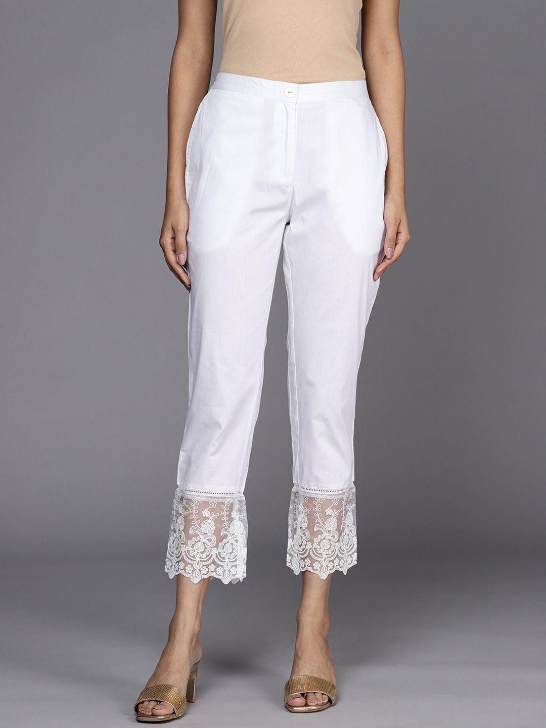 libas women white solid pure cotton trousers with lace inserts