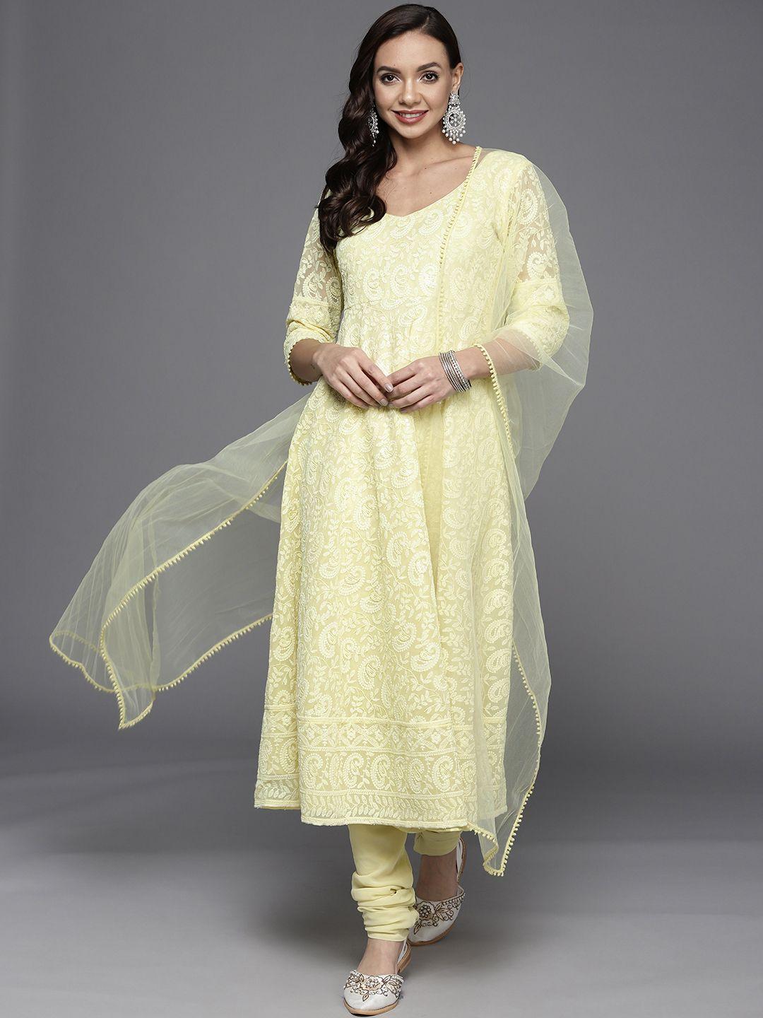 libas women yellow paisley embroidered thread work kurta with churidar & with dupatta