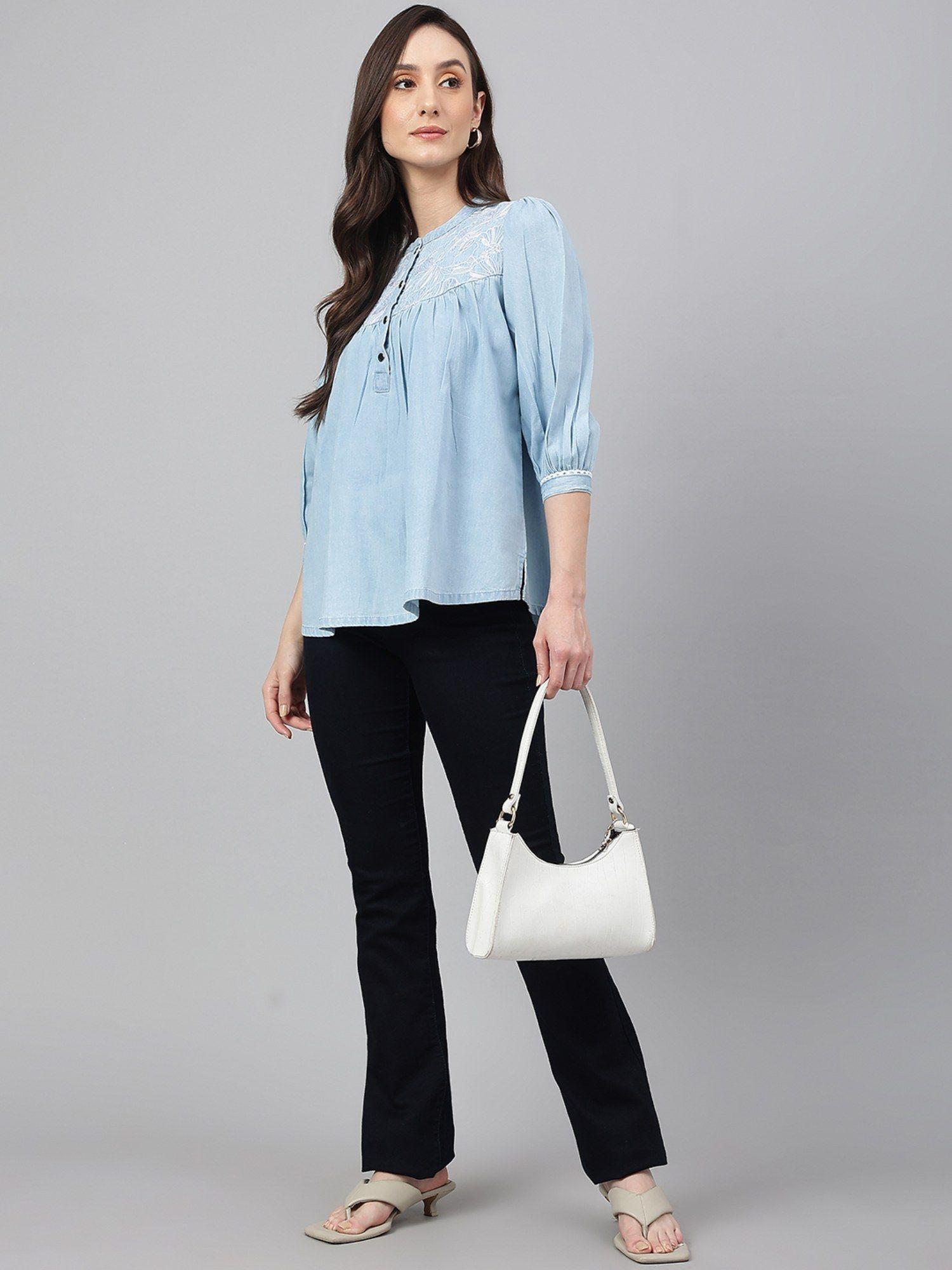 light blue denim embroidered flared top