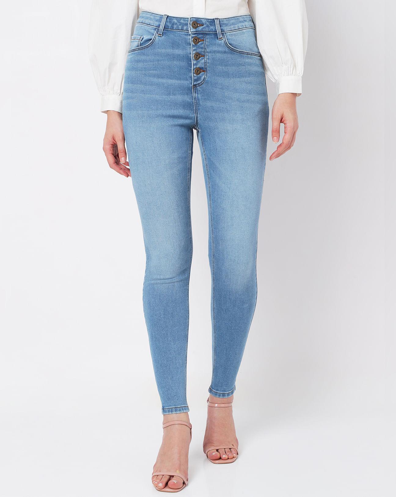 light blue high rise buttoned skinny jeans