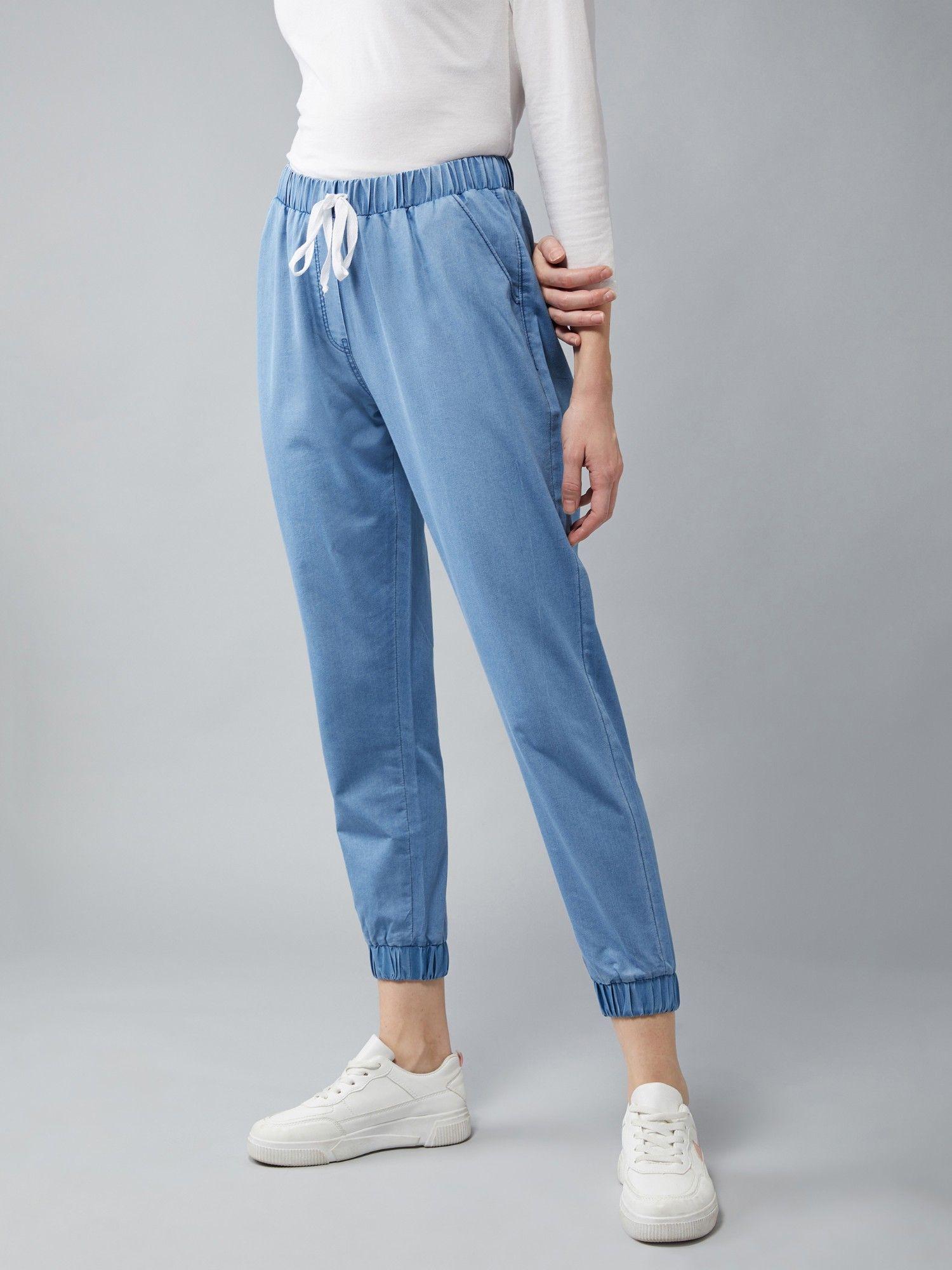 light blue mid rise denim joggers