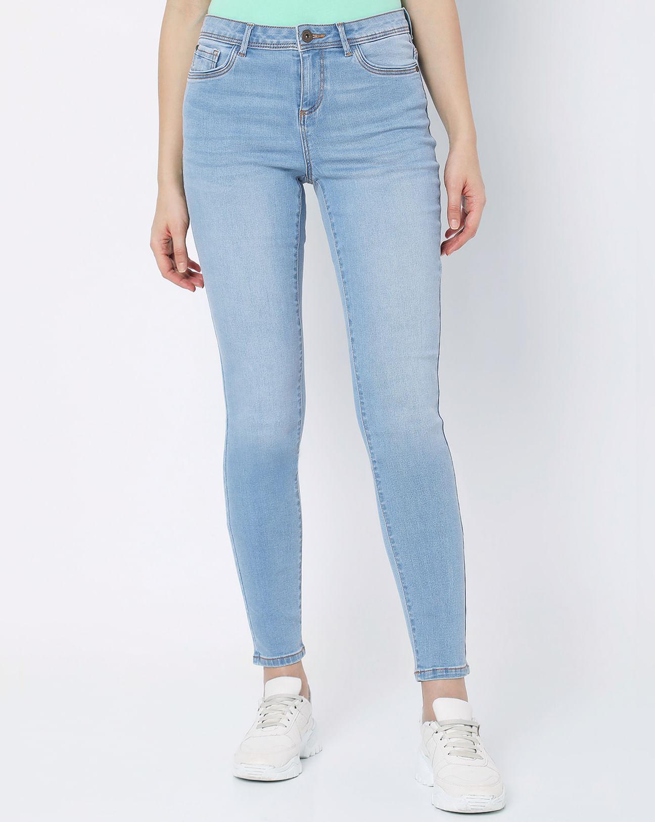 light blue mid rise skinny jeans