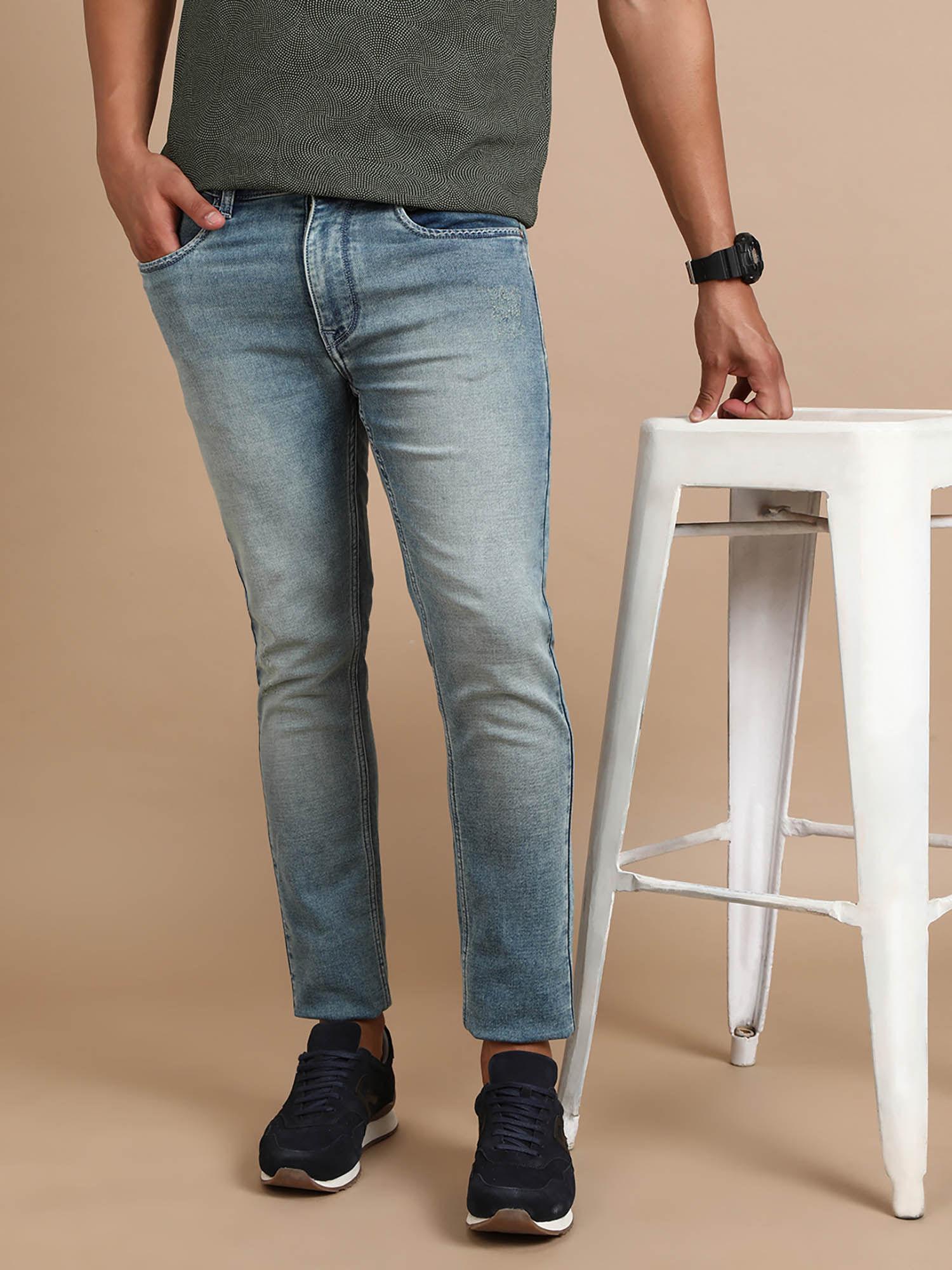 light blue solid mid rise slim fit jeans