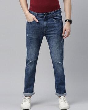 light-distressed  slim jeans with 5-pocket styling