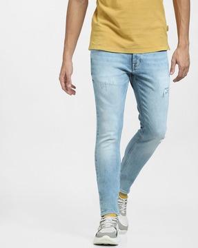 light-distressed skinny fit jeans