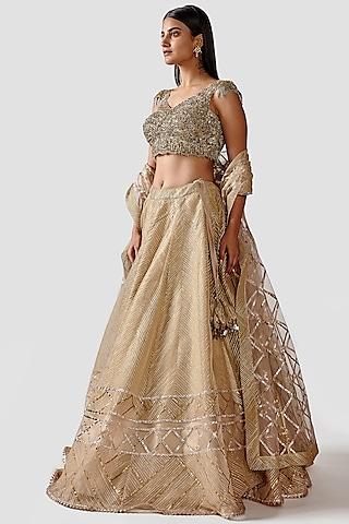 light gold lehenga set with hand embroidery