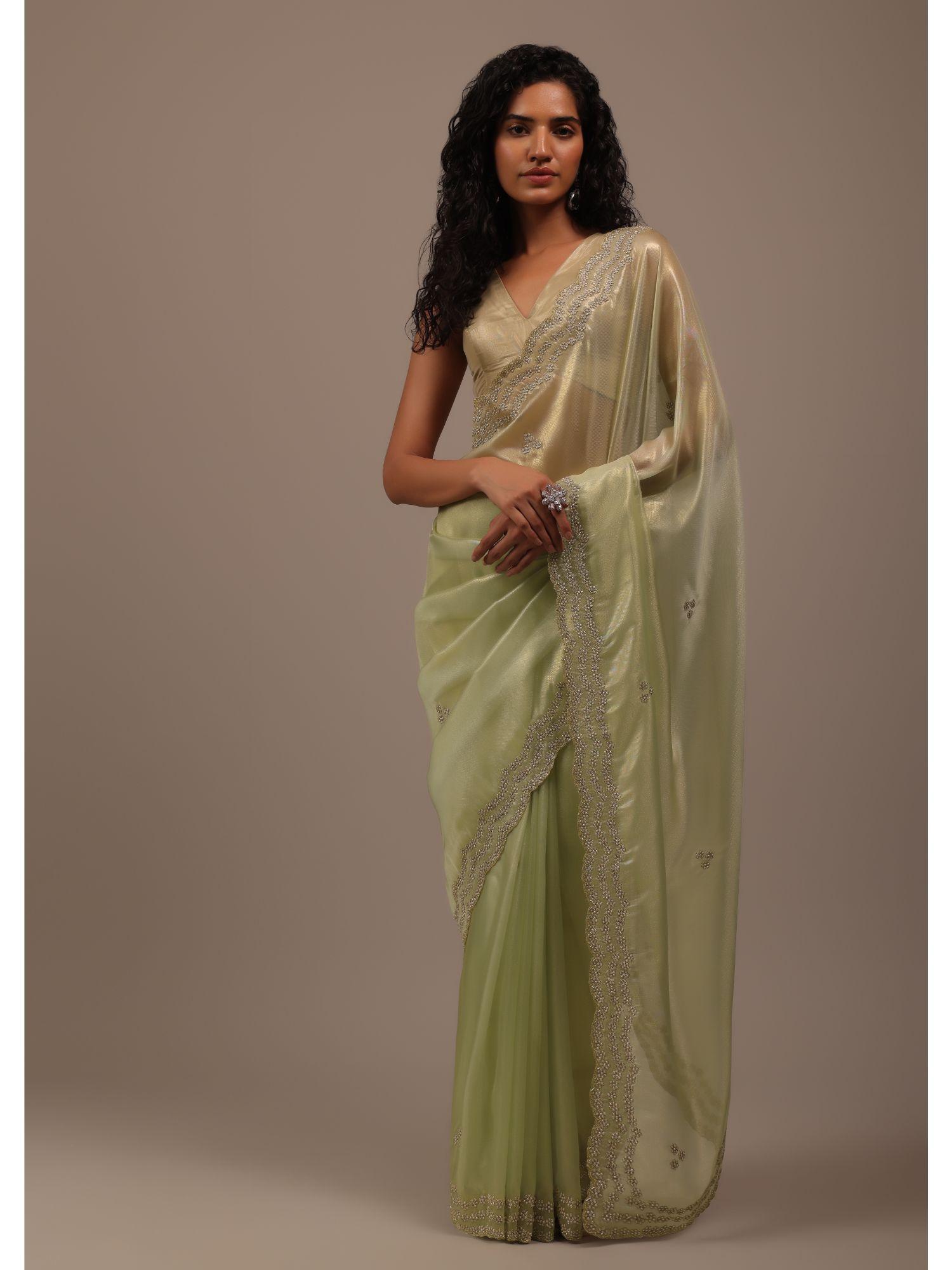 light green foil saree in tissue with cut dana embroidered borders with unstitched blouse