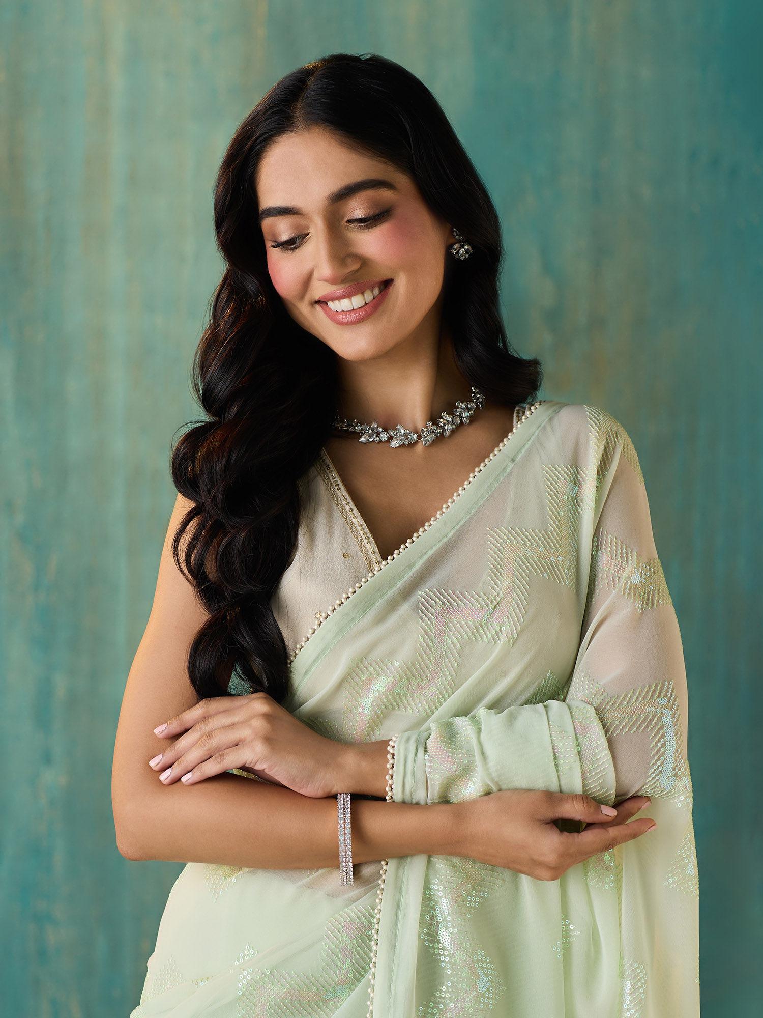 light green georgette embellished and sequined saree with unstitched blouse liksar114 (free size)