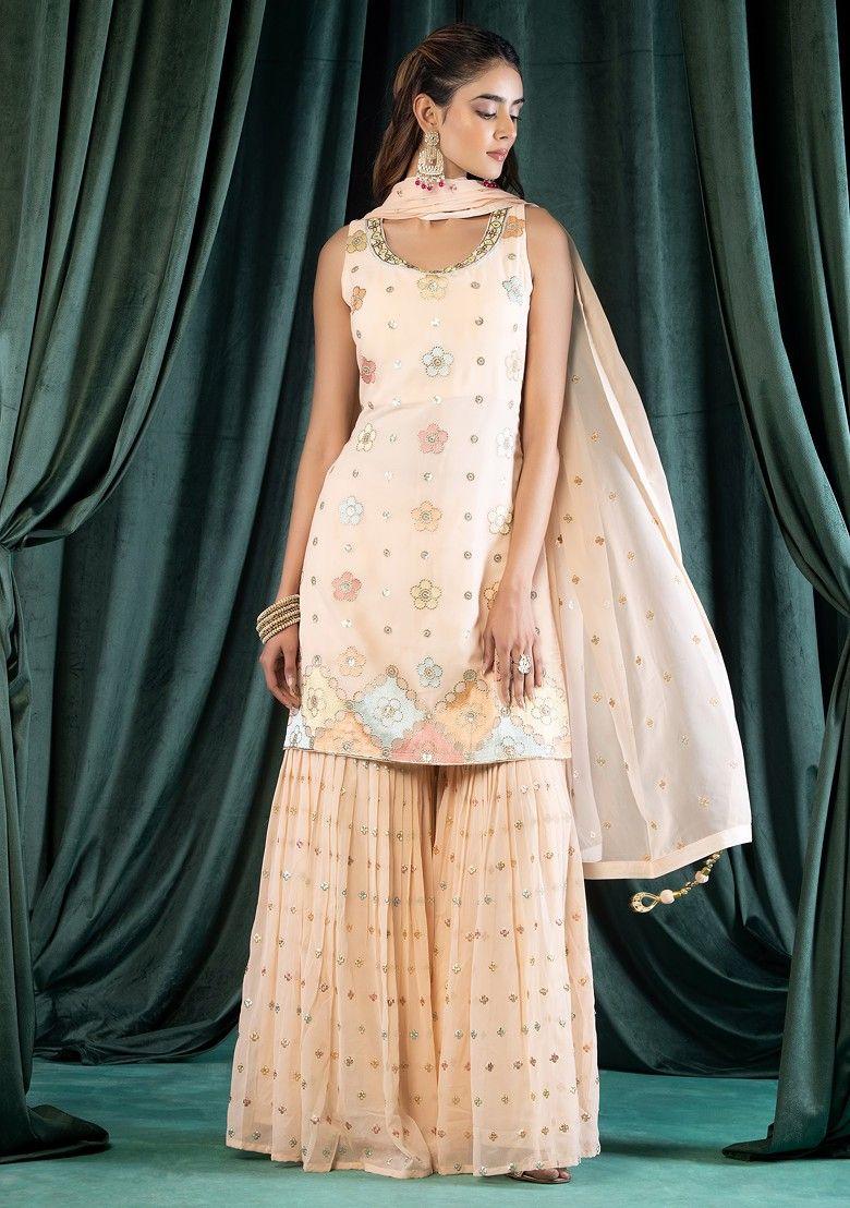 light peach embroidered sharara set with multicolour embroidered kurta and dupatta