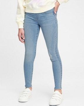 light-wash distressed jeans