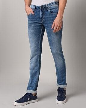 light-wash distressed skinny fit jeans