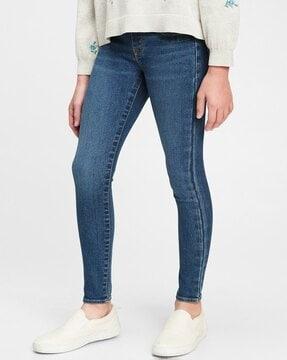 light-wash mid-rise skinny jeans