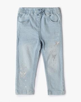 light-wash butterfly embellished regular fit jeans
