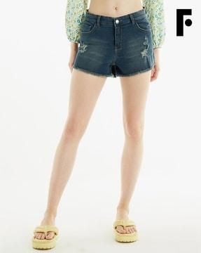 light-wash distressed shorts