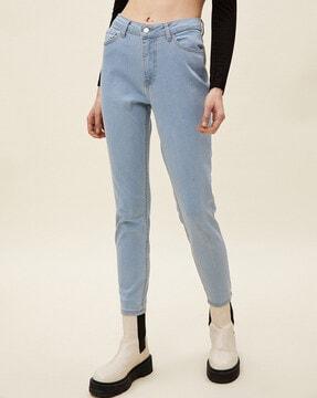 light-wash high-rise slim fit jeans